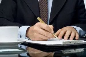 Man Filling in Questionnaire